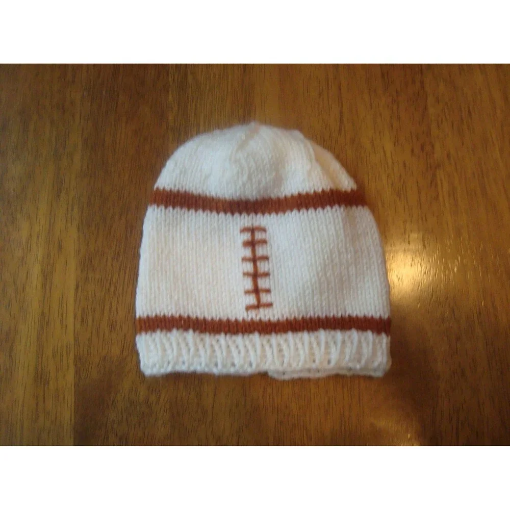 University of Texas baby football hat, burnt orange and white